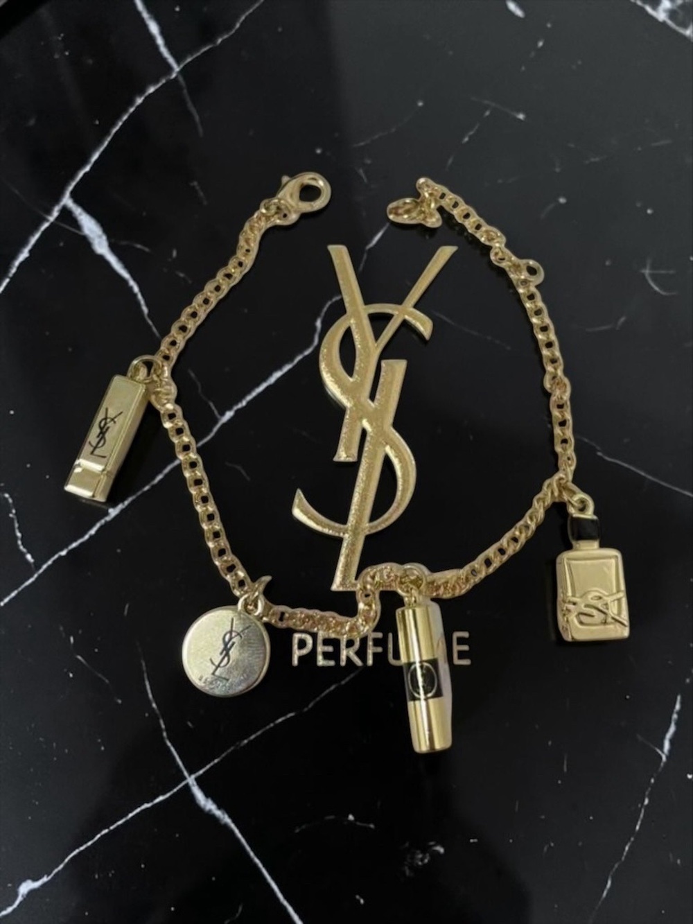 NIB RESERVED FOR @purely_luxe YSL Beauté Limited Edition Gold Charm Bracelet - Picture 3 of 5